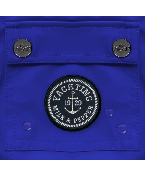 Pršiplášť pre buldogov Tribord Blue 35L 2